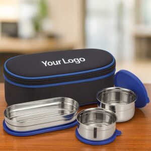 3 steel containers black and blue lunchbox displayed on office table