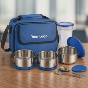 blue lunchbox 3 steel containers 1 plastic tumbler displayed on office table