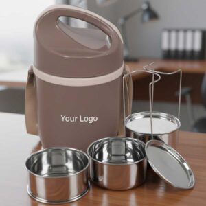 brown inner steel insulated lunch box 3 steel containers displayed on office table