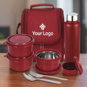 mahroon microwave safe lunchbox with bottle spoon fork displayed on office table