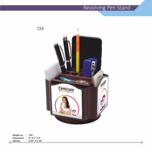 A high-angle image of a dark brown Customizable revolving pen stand, model no. 154, holding a smartphone, pens, a stapler, and paper clips. The front and side panels feature custom branding with a person and the word "Centrum." Product dimensions are visible below.